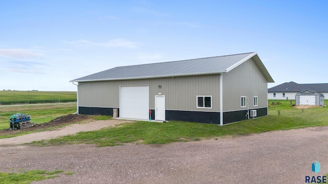 view of outbuilding featuring a garage