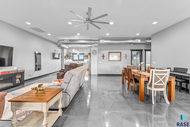 living room with ceiling fan