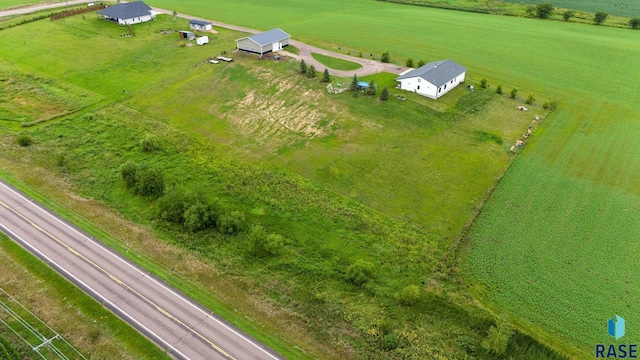 birds eye view of property featuring a rural view