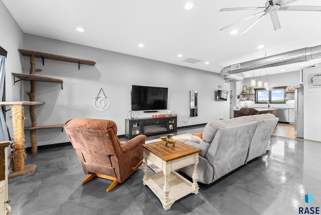 living room with ceiling fan