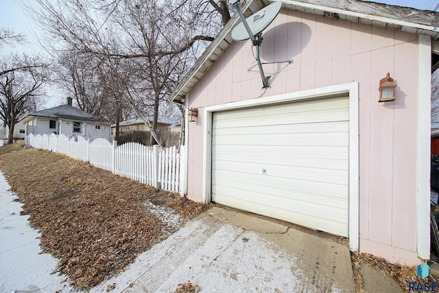 view of snow covered garage