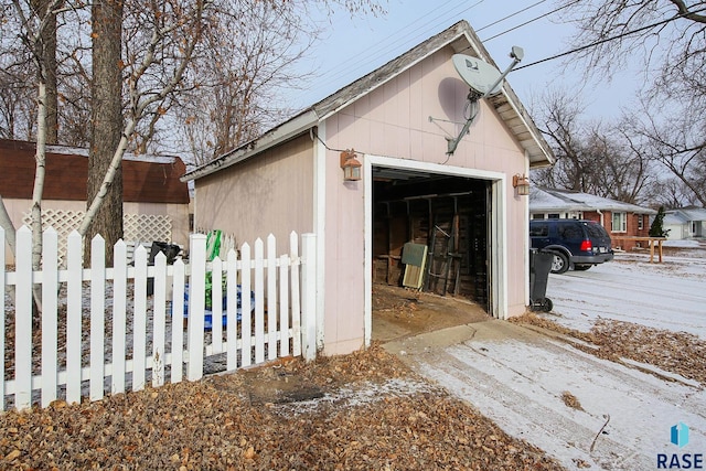 view of snow covered garage