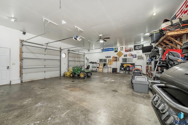 garage featuring ceiling fan and a garage door opener