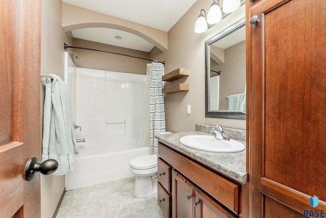 full bathroom with shower / tub combo, vanity, and toilet