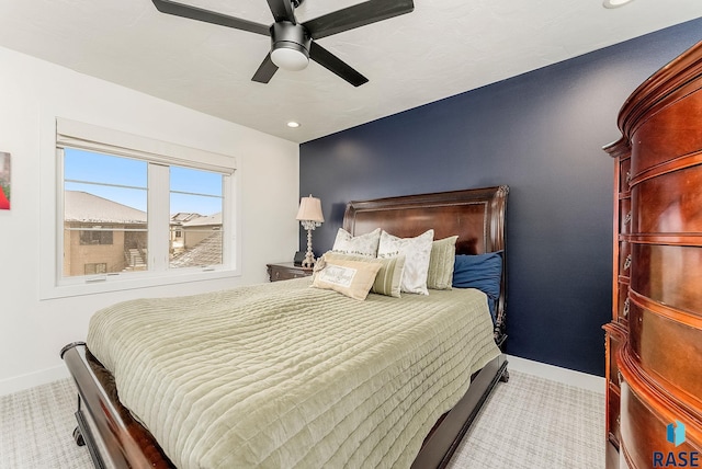 bedroom featuring a ceiling fan, recessed lighting, light carpet, and baseboards