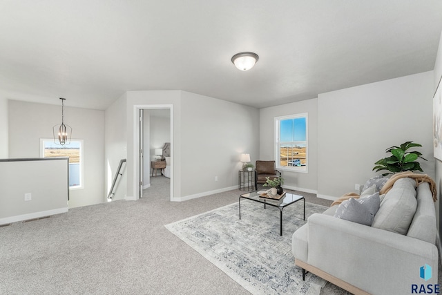 living room with carpet and plenty of natural light