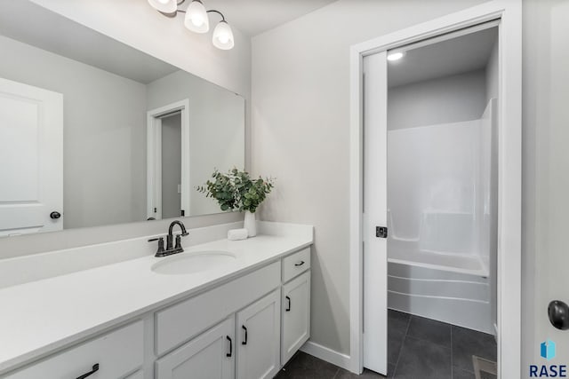 bathroom with shower / tub combination, tile patterned flooring, and vanity