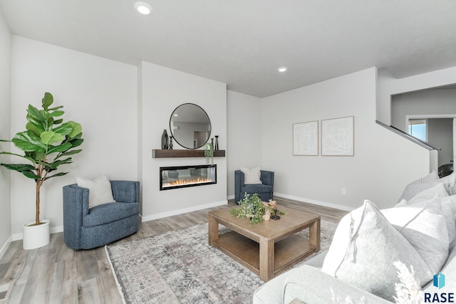 living room with light hardwood / wood-style floors