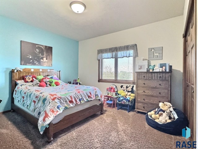 bedroom featuring a closet and carpet