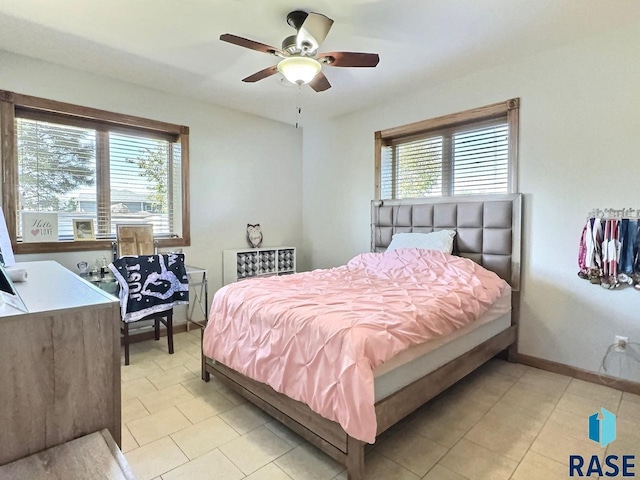 bedroom featuring ceiling fan