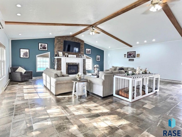 living room with vaulted ceiling with beams, ceiling fan, and a fireplace