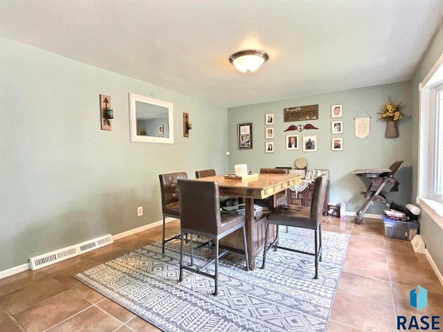 view of tiled dining space