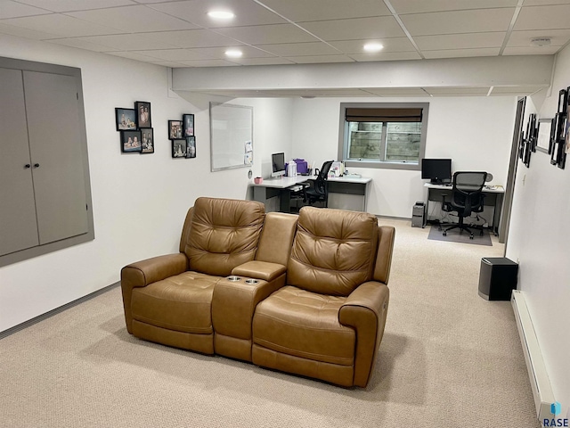 interior space featuring carpet, a drop ceiling, and baseboard heating