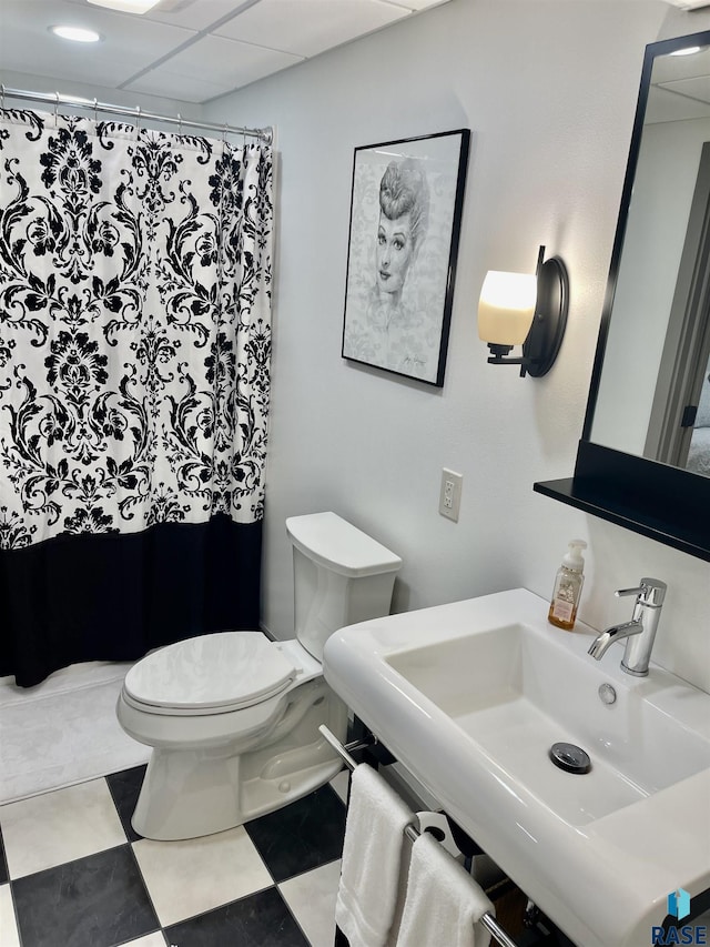 bathroom with sink and toilet