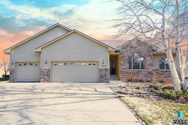 single story home featuring a garage