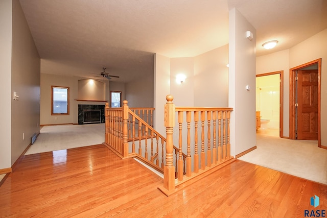 hall with light wood-type flooring