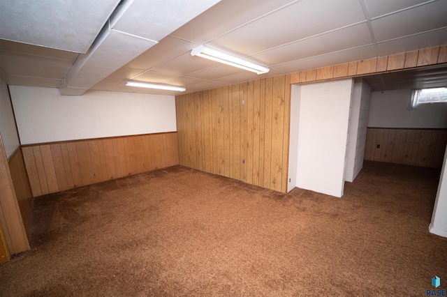 basement with dark carpet