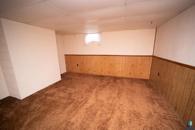 basement with dark colored carpet