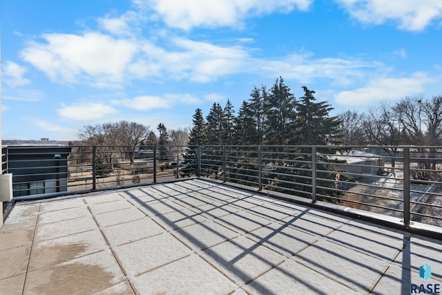 view of patio with a balcony