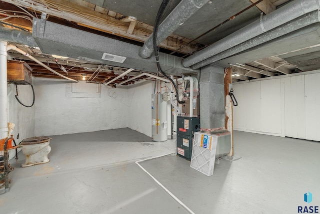 basement featuring water heater