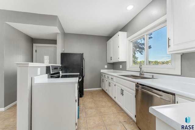 kitchen featuring stove, sink, light tile patterned floors, dishwasher, and white cabinetry