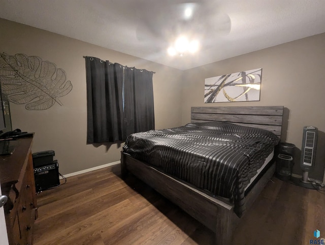 bedroom featuring hardwood / wood-style floors