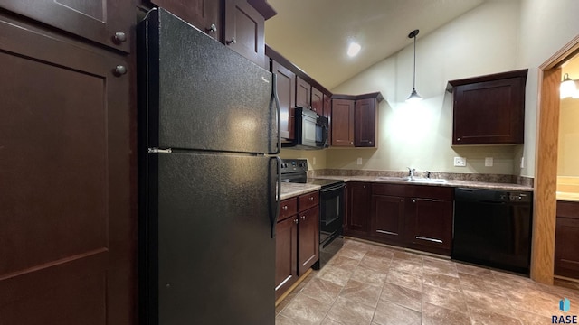 kitchen featuring dark brown cabinetry, sink, black appliances, decorative light fixtures, and lofted ceiling