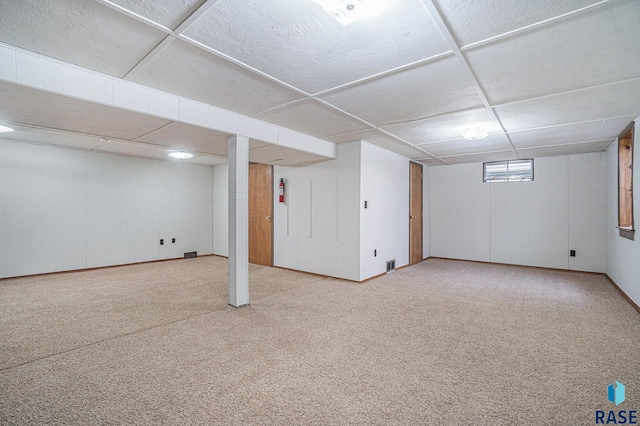 basement with light carpet