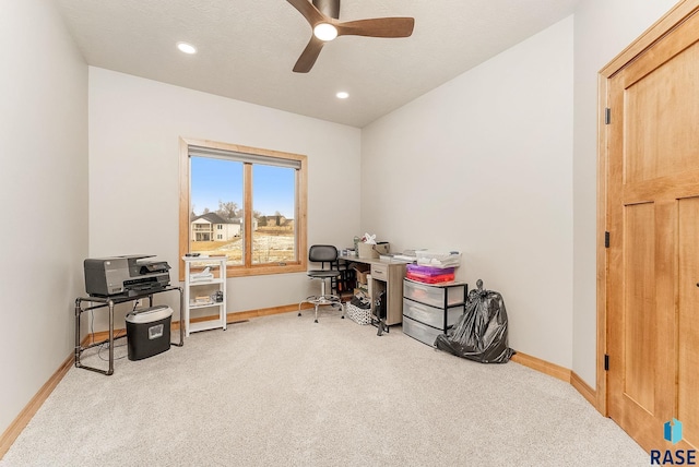 carpeted office with ceiling fan