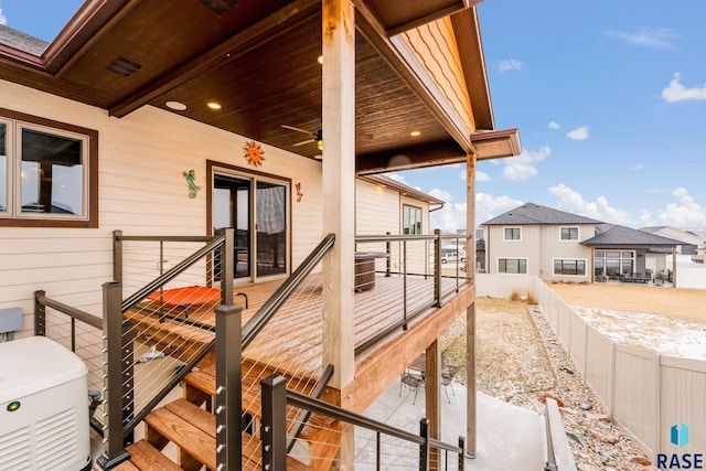 wooden deck with ceiling fan