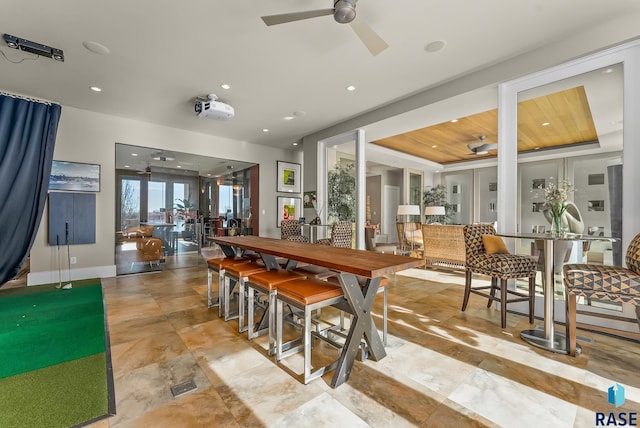 dining room featuring ceiling fan