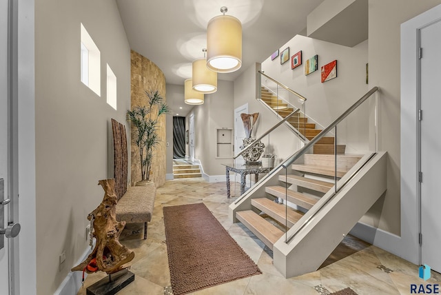 stairs with a towering ceiling