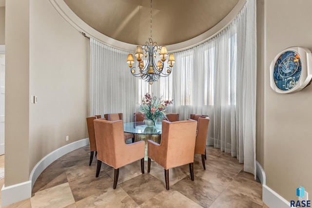 dining room featuring a notable chandelier