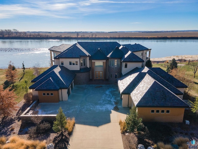 birds eye view of property featuring a water view