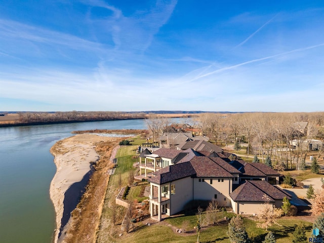 bird's eye view with a water view