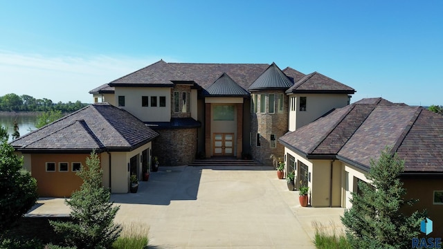 view of front of home featuring a water view