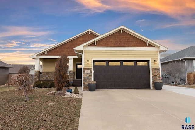 craftsman-style house featuring a garage