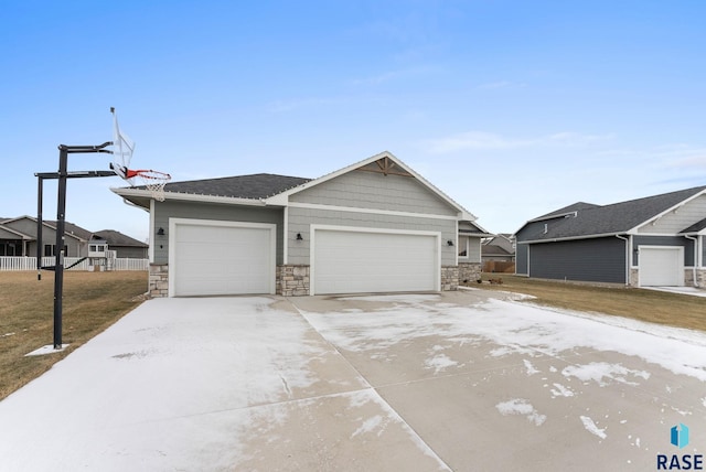 view of front of home featuring a front yard and a garage