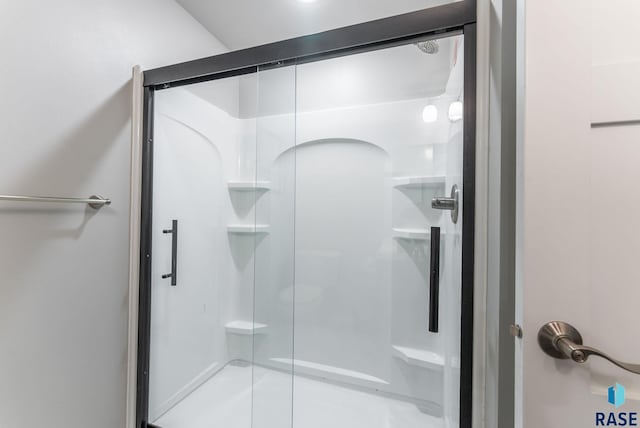 bathroom with an enclosed shower