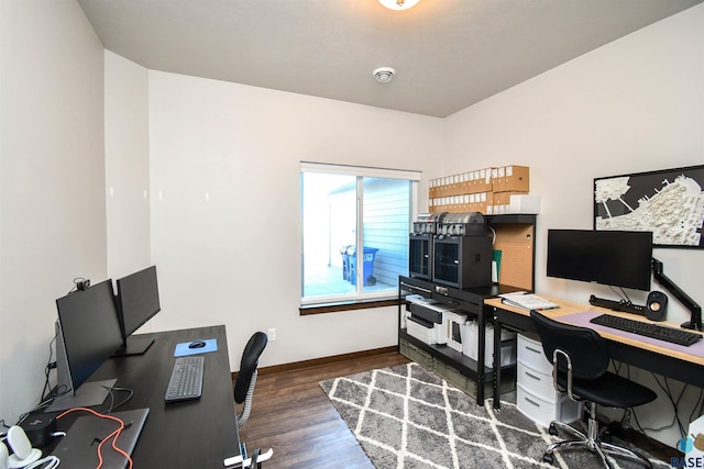 home office featuring dark hardwood / wood-style flooring