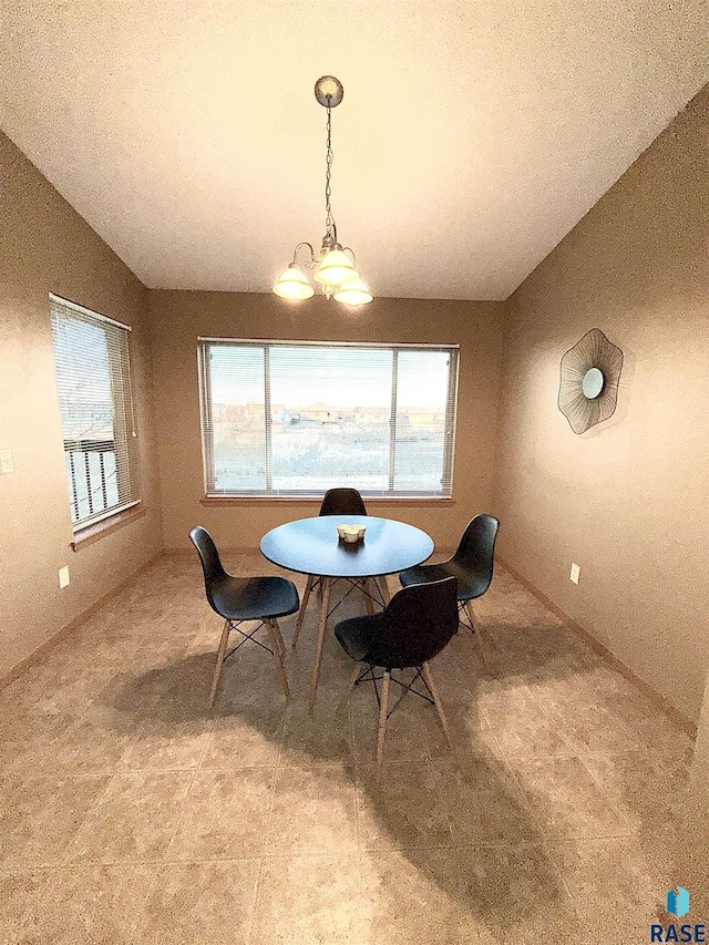 dining room featuring an inviting chandelier