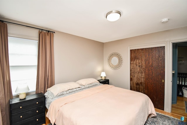 bedroom featuring hardwood / wood-style flooring