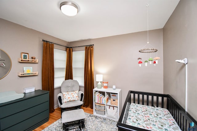 bedroom featuring light hardwood / wood-style floors