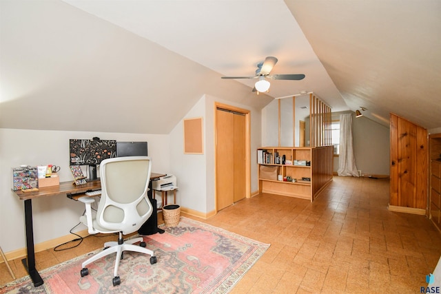 office space featuring ceiling fan and lofted ceiling