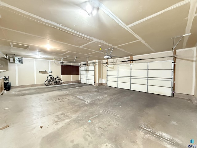 garage featuring a garage door opener