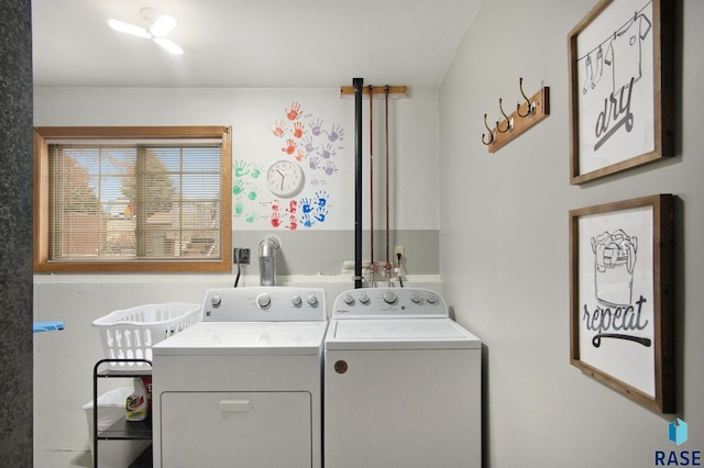 clothes washing area with washer and dryer