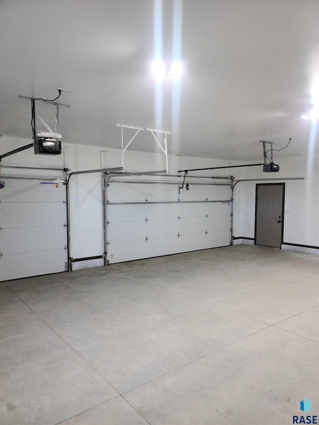 garage featuring a garage door opener