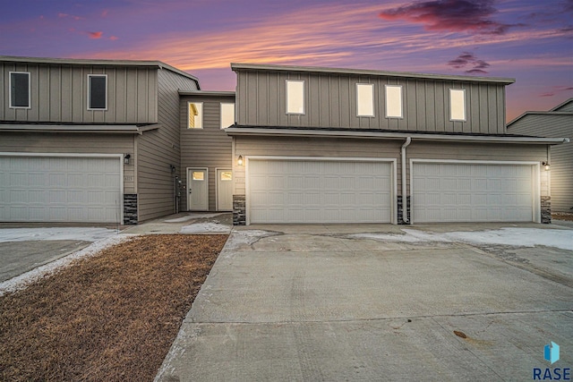 view of front of property featuring a garage