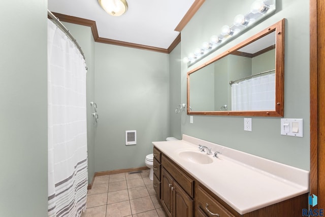 bathroom with tile patterned flooring, vanity, toilet, and crown molding