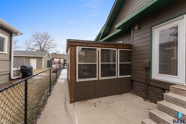 view of property exterior with a patio